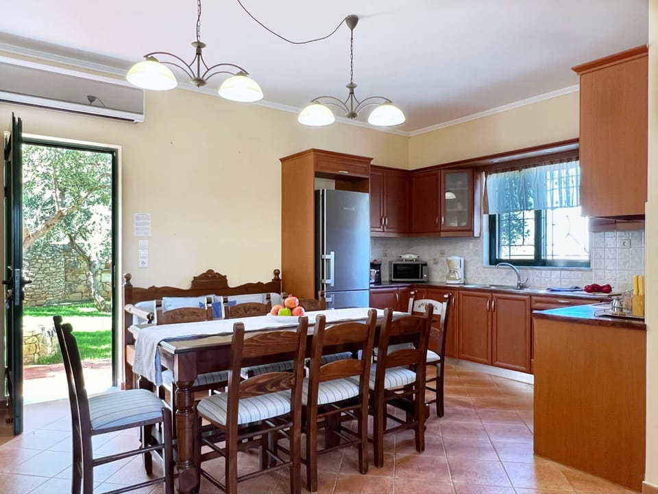 Villa Artemis, Crete, Vrises, the kitchen area with large dining table