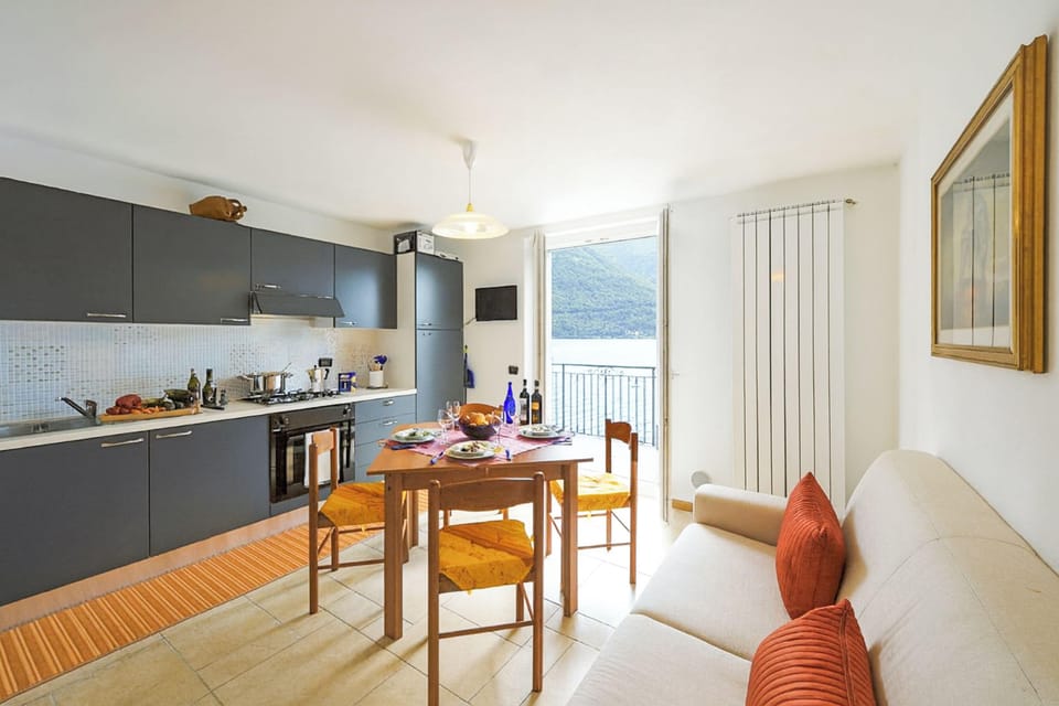 Family Villa, 4 Bedrooms, 2 Bathrooms, Lakeside (Villa L'Approdo) | Private kitchen | Fridge, microwave, oven, stovetop