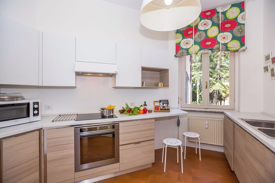 Family Apartment, Multiple Bedrooms, Lakeside (Nobiallo Fronte Lago) | Private kitchen | Full-size fridge, microwave, oven, stovetop