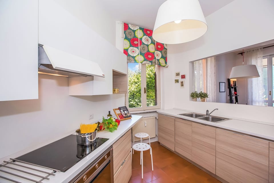 Family Apartment, Multiple Bedrooms, Lakeside (Nobiallo Fronte Lago) | Private kitchen | Full-size fridge, microwave, oven, stovetop