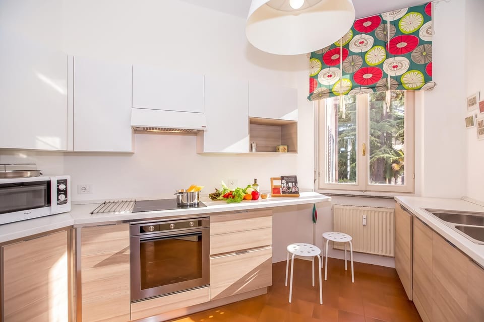 Family Apartment, 2 Bedrooms, Microwave, Lakeside (Nobiallo Fronte Lago) | Private kitchen | Coffee/tea maker, full-size fridge, microwave, oven