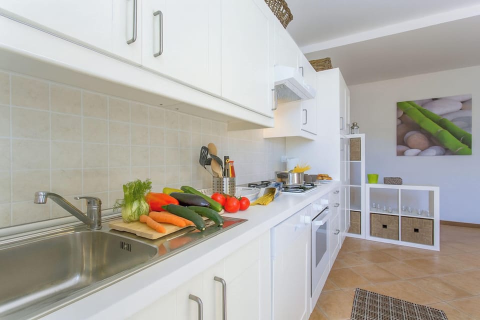 Family Apartment, Multiple Bedrooms (Casa Al Prato Apt. F) | Private kitchen | Full-size fridge, microwave, oven, stovetop