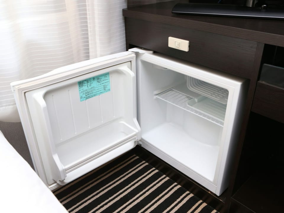 Desk, blackout drapes, soundproofing, iron/ironing board
