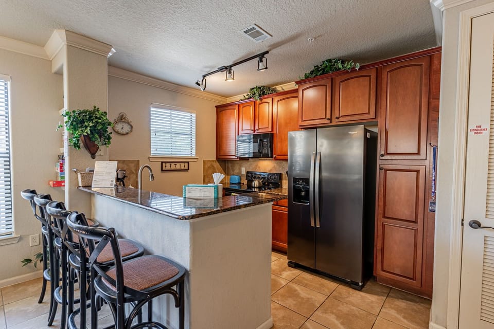 Condo, Multiple Beds, Patio, Garden View (Bella Piazza Condo) | Private kitchen | Fridge, microwave, stovetop, dishwasher