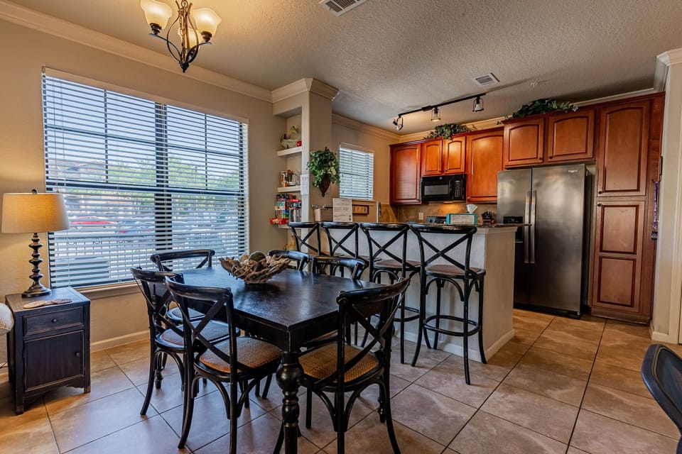 Condo, Multiple Beds, Patio, Garden View (Bella Piazza Condo) | Dining