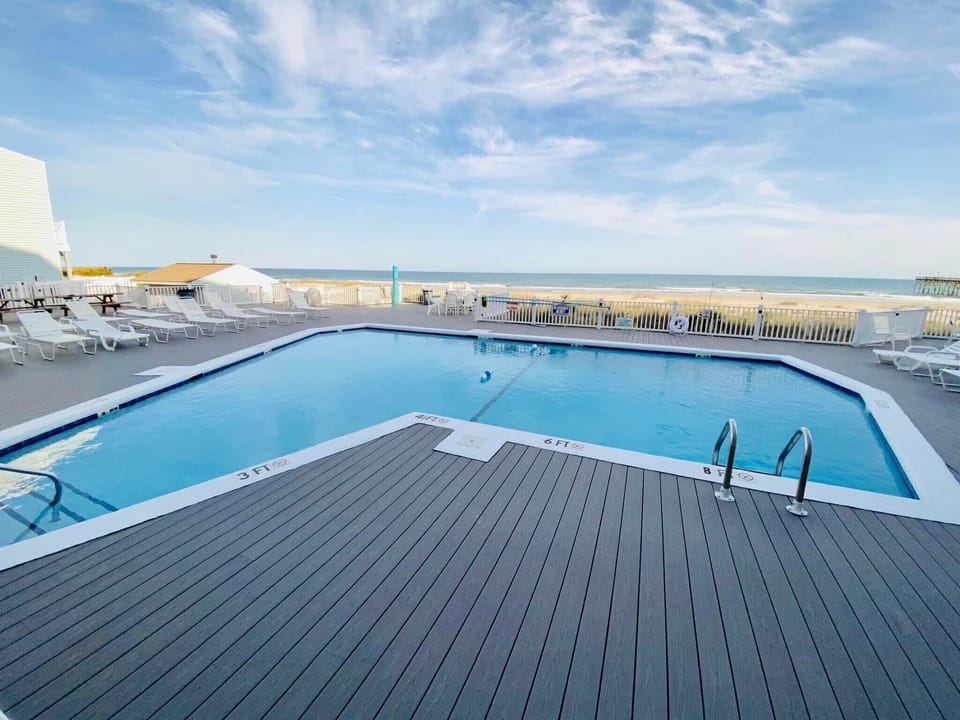 Trex decking around the pool. No splinters!