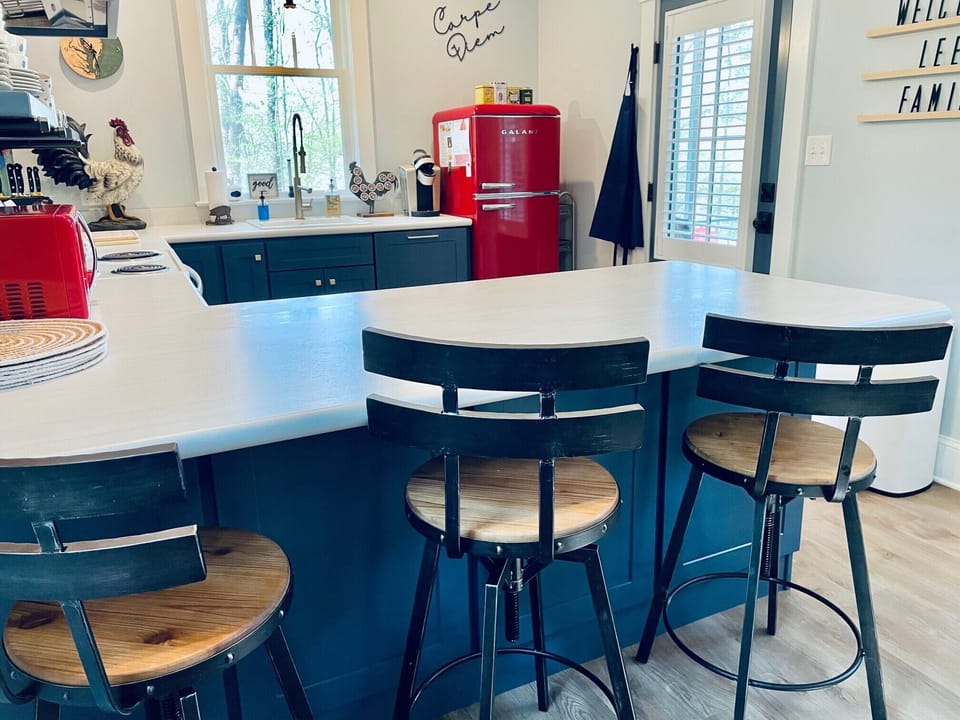 Peninsula seats 3 table seats 4