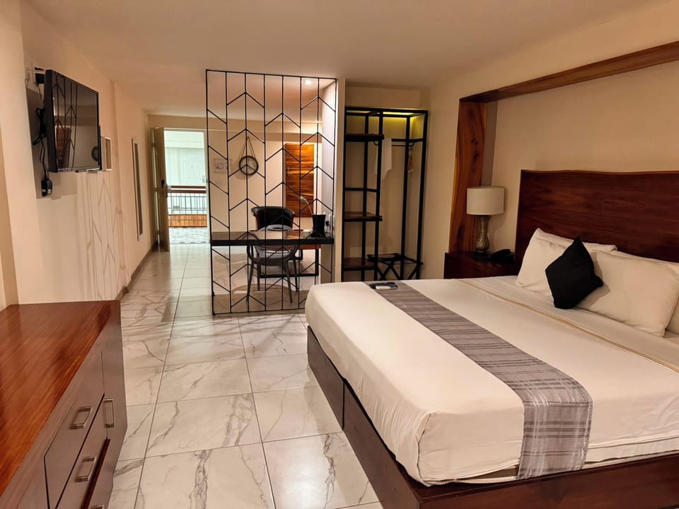 Deluxe Room | Memory foam beds, desk, laptop workspace, blackout drapes