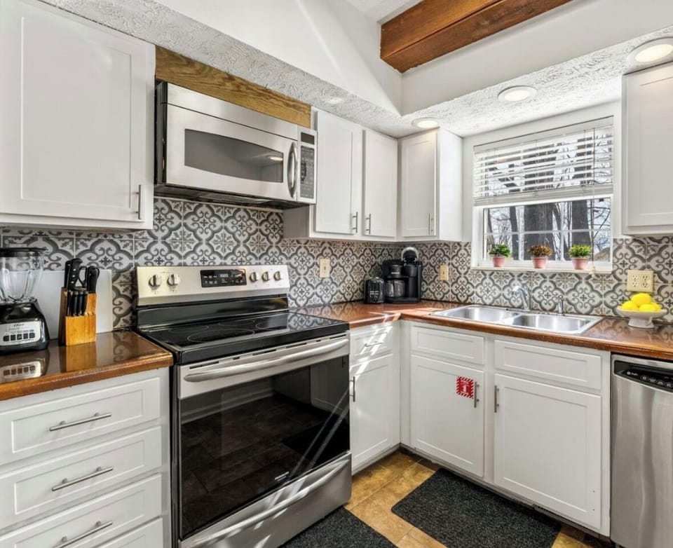 Well stocked kitchen with new appliances.