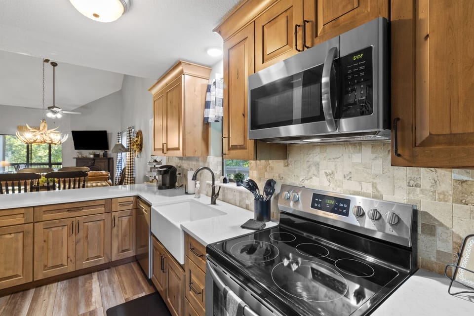 Kitchen has brand new cabinets, counter tops, sink, fixtures, appliances &  more