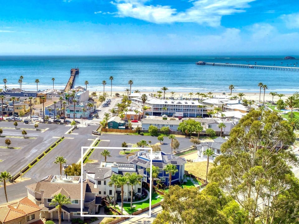 aerial view of house, downtown Avila, piers, beach and the ocean