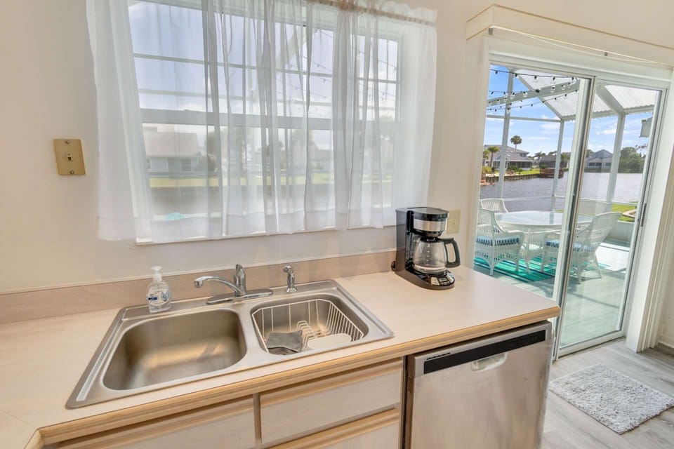 Enjoy the tranquil water views while cooking up a storm.