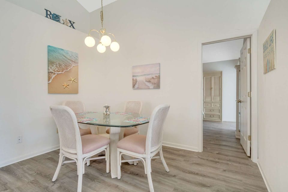 Gather with loved ones in this charming dining area.