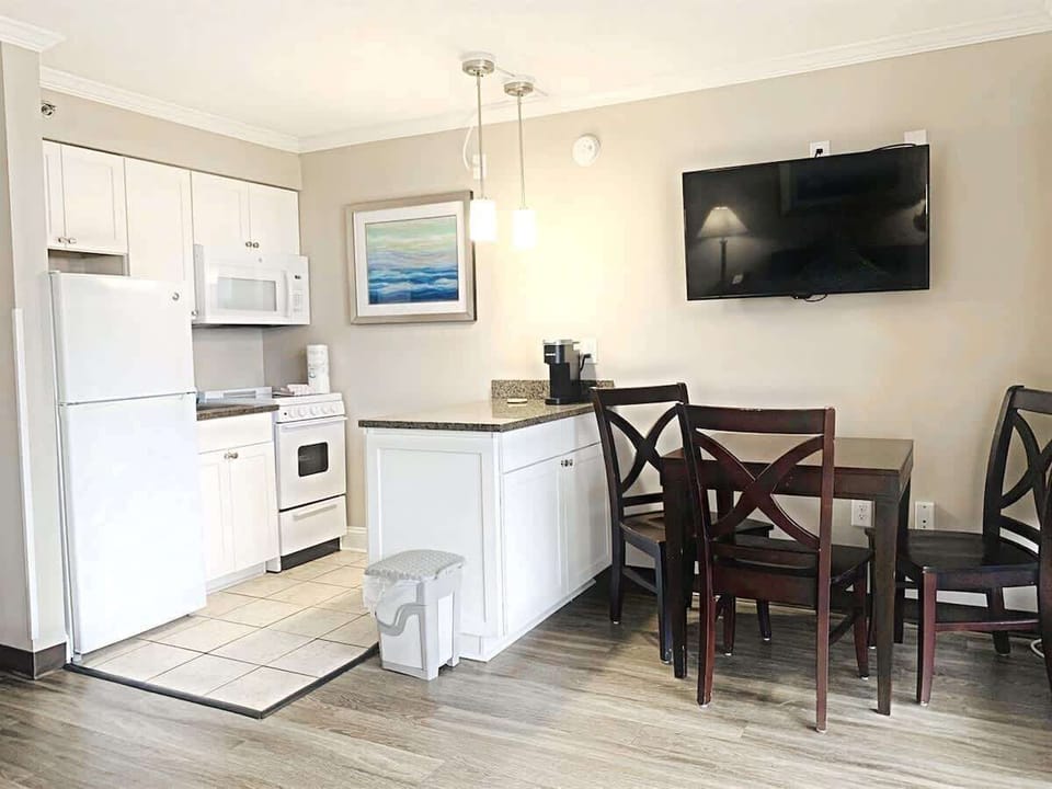 Prepare delicious meal in our Fully Equipped Kitchen
