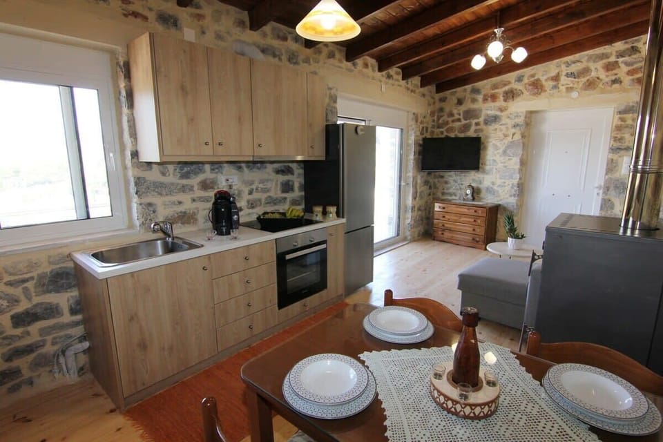 Fully Equipped Kitchen Space – Includes all modern appliances and rustic touches for home-cooked meals.