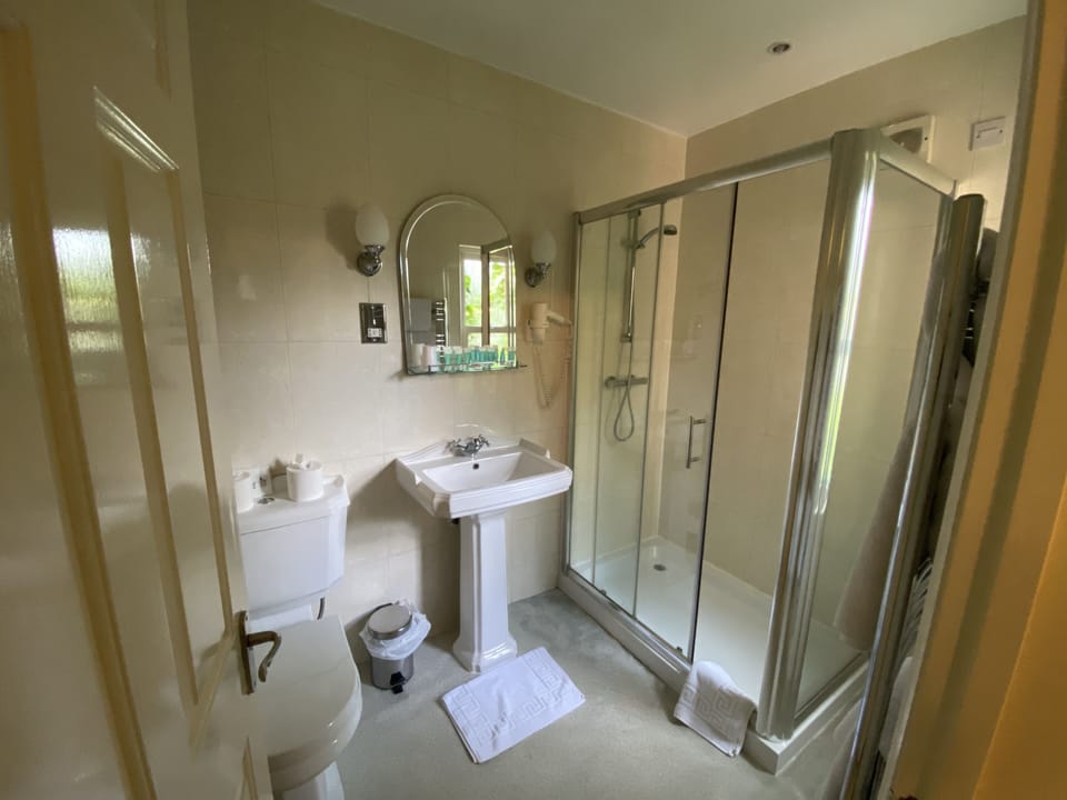 Shower, free toiletries, towels, soap