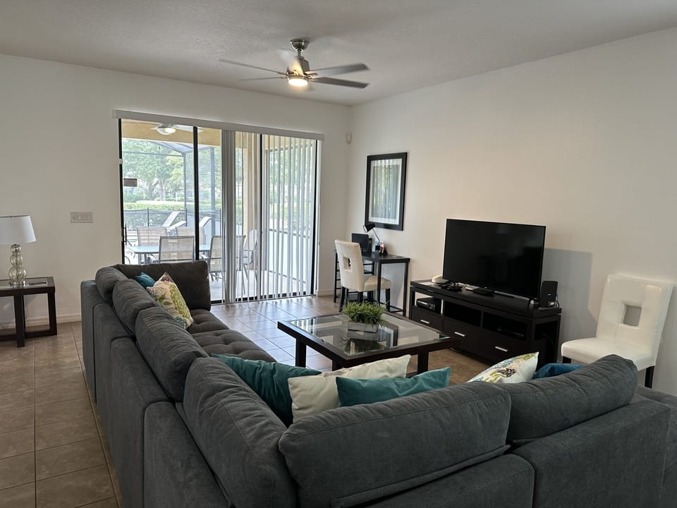 Light filled living space with access to pool area