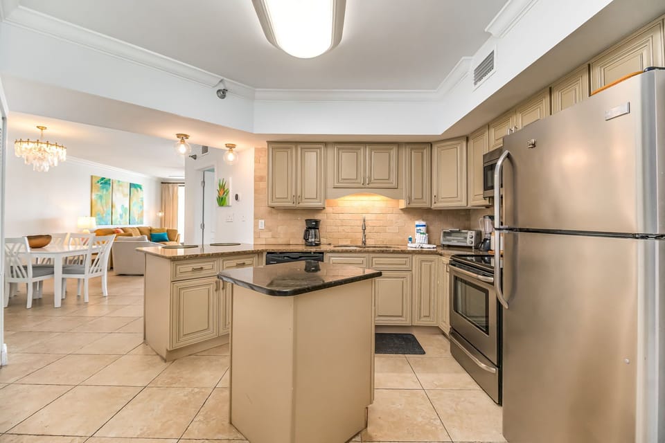 Gourmet kitchen with custom cabinetry and stainless appliances - Orange Beach vacation rental