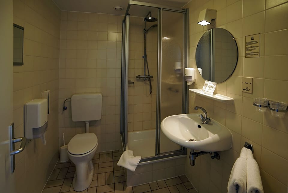 Shower, towels, soap, shampoo