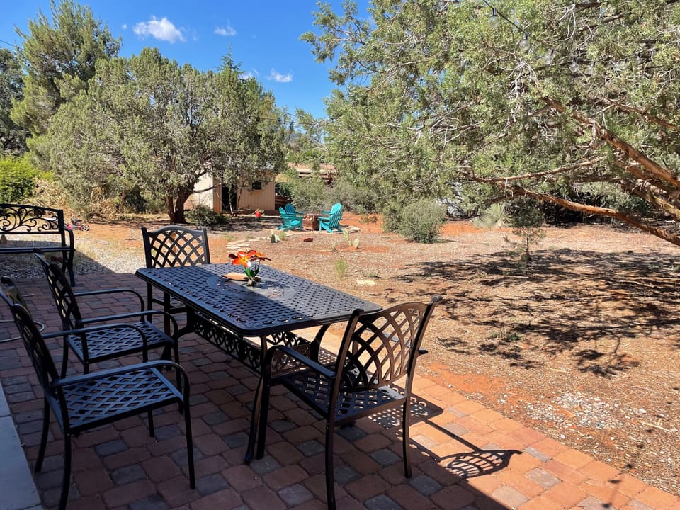 Paver back patio with seating