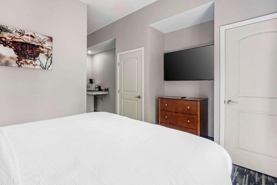 Standard Room, 2 Queen Beds, Non Smoking | Desk, laptop workspace, blackout drapes, iron/ironing board