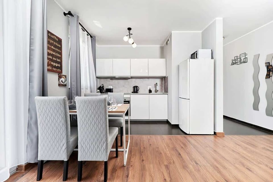 The living room's modern and stylish decor creates a welcoming and atmosphere. 