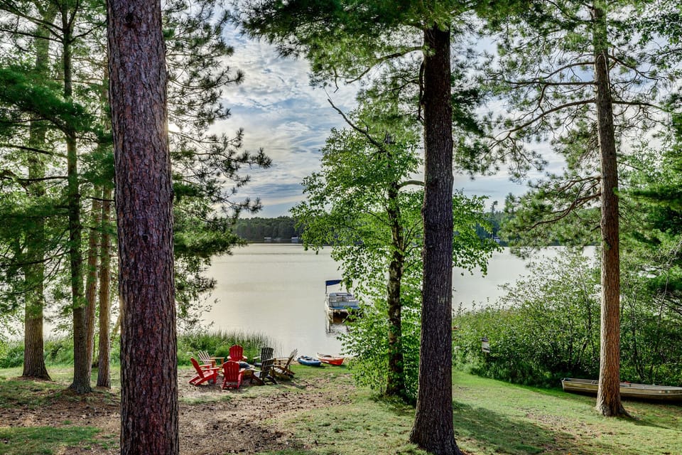 Towering pine trees makes for a stunning lakeview from your decks.