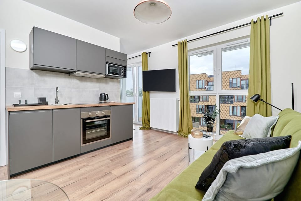 The fully equipped kitchenette includes everything you need for a home-cooked meal.