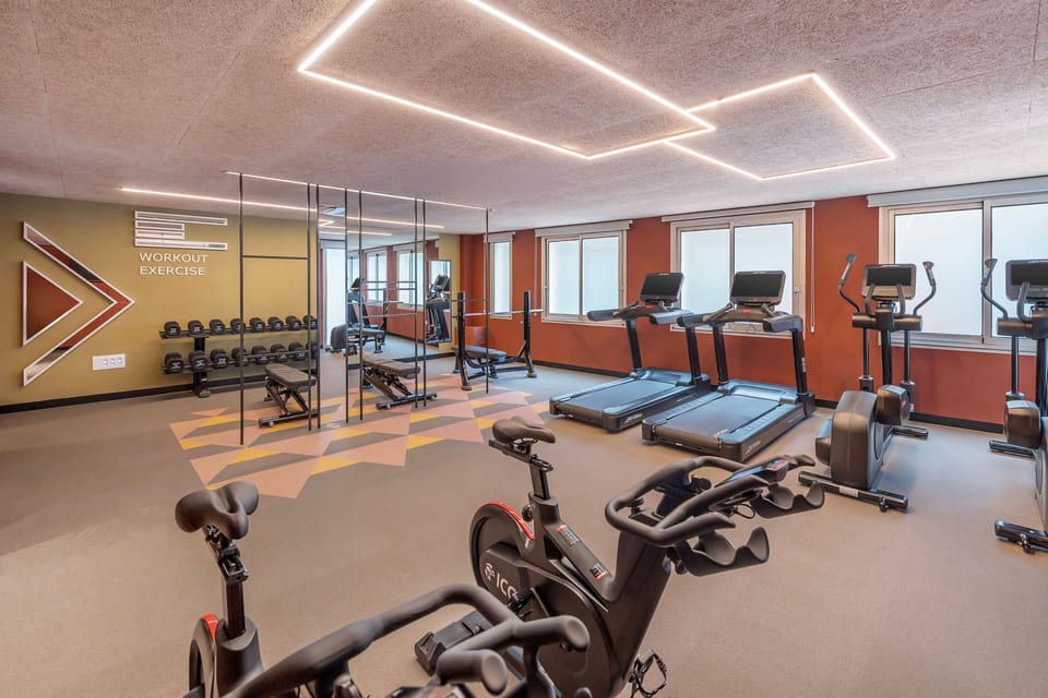 Fully equipped fitness centre featuring modern cardio and strength training equipment to keep you active during your stay.