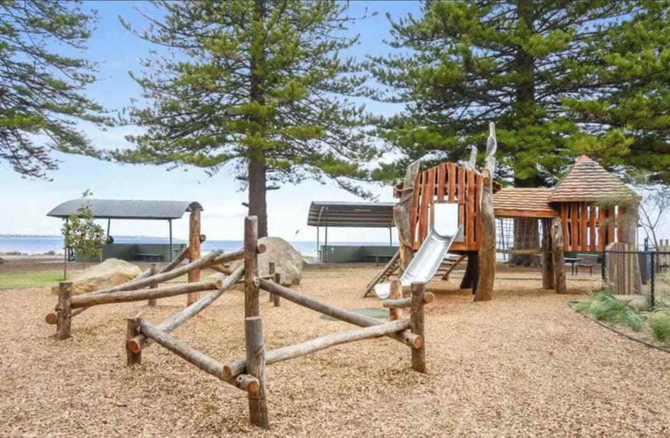 the playground is across the road from the Breeze apartments