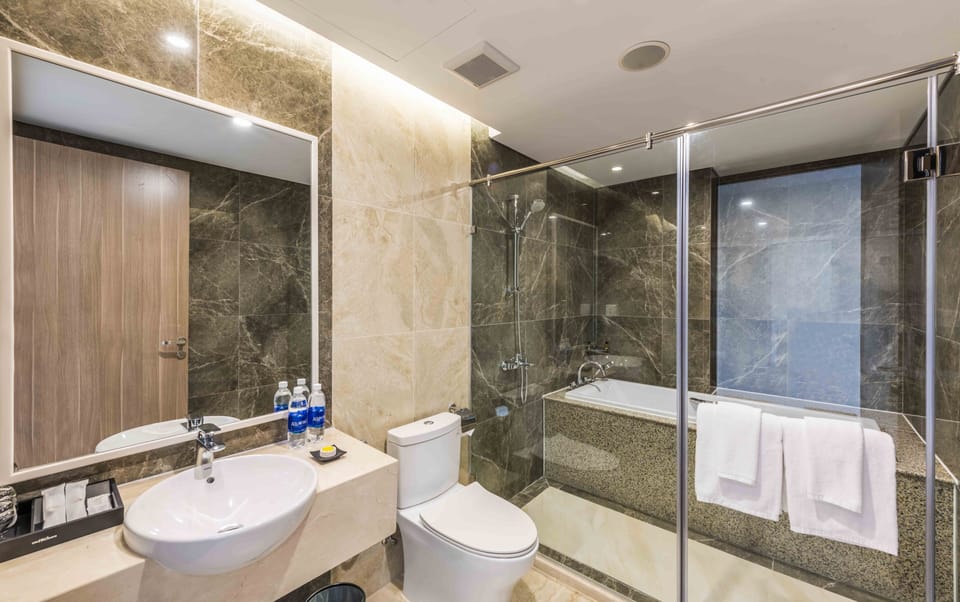 Hair dryer, bathrobes, bidet, towels