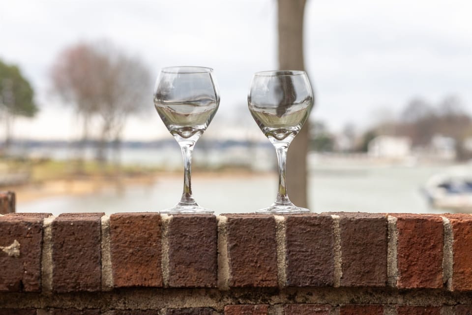 Enjoy a cocktail and watch the sunsets on the lake