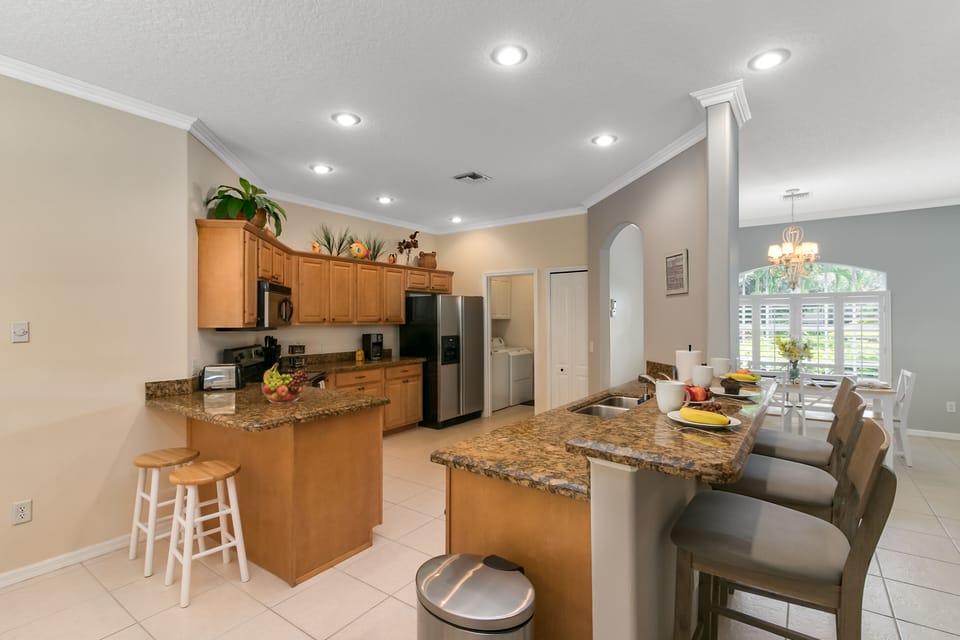 Kitchen with additional bar seating
