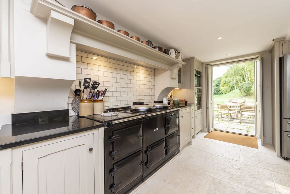 Manor Farmhouse, Cruxton: Kitchen with Aga