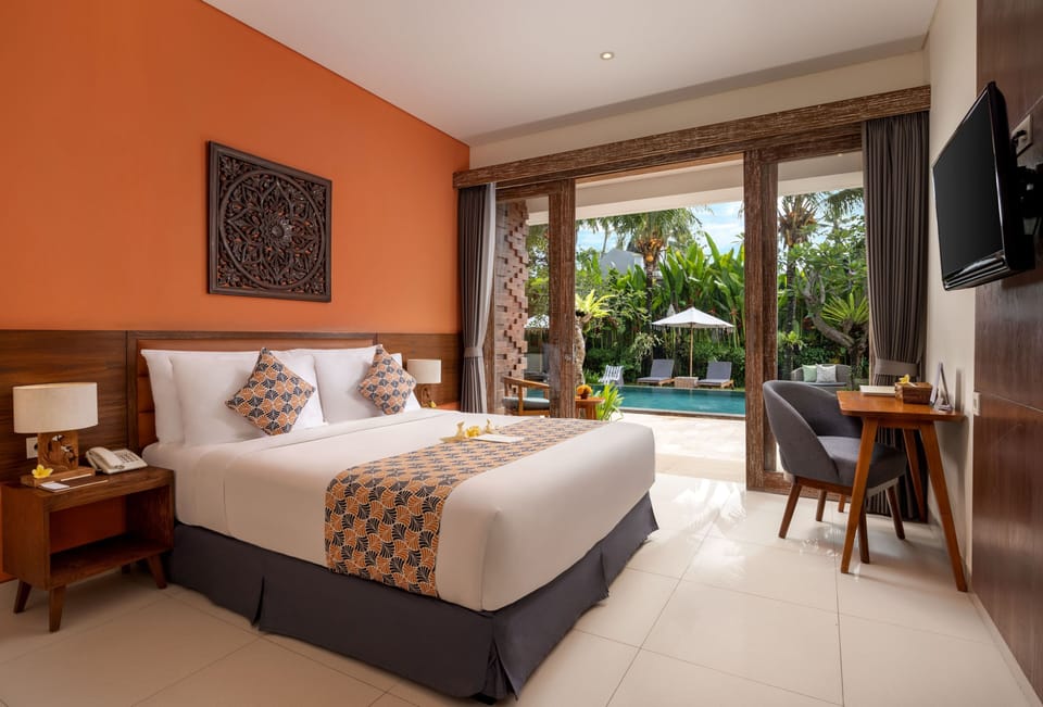 Deluxe Room, Pool View | Hypo-allergenic bedding, desk, free WiFi, bed sheets