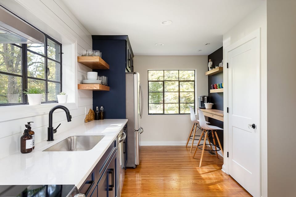Brand new, fully-equipped kitchen with open shelving.