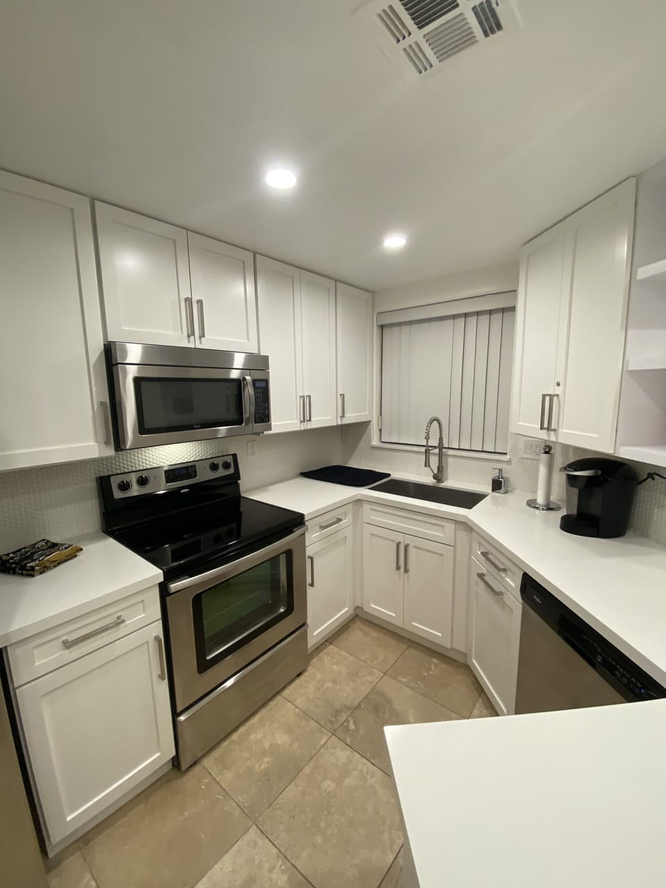 Newly remodeled kitchen with quartz countertops 