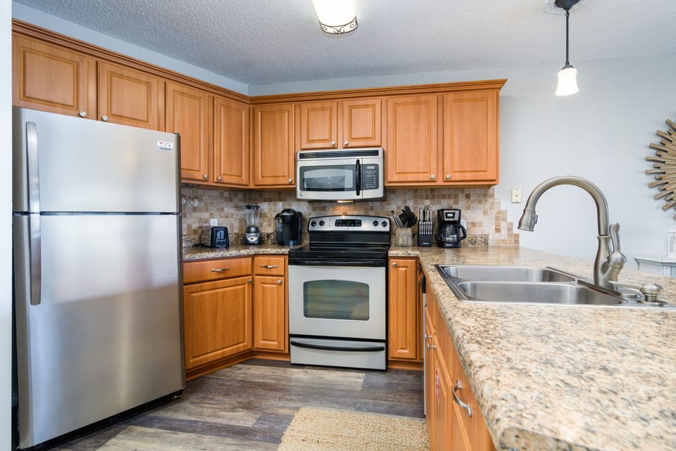 Fully stocked, updated kitchen offers all the appliances and space you'll need! 
