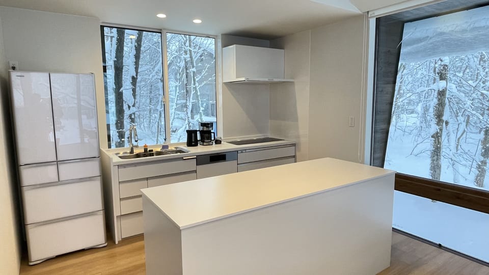 Luxury Chalet | Private kitchen | Coffee/tea maker, full-size fridge, microwave, oven