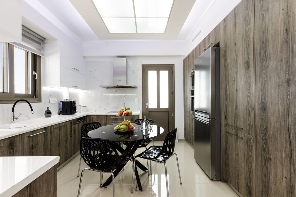 Featuring a breakfast table & coffee machine. 