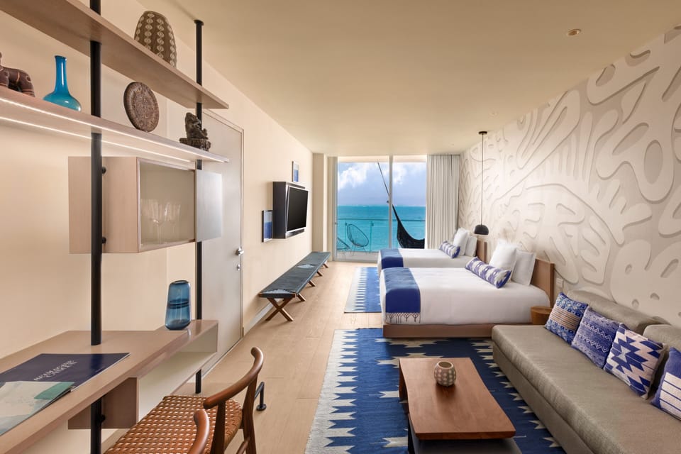 Deluxe Suite, 1 Bedroom, Oceanfront | Premium bedding, minibar, in-room safe, desk