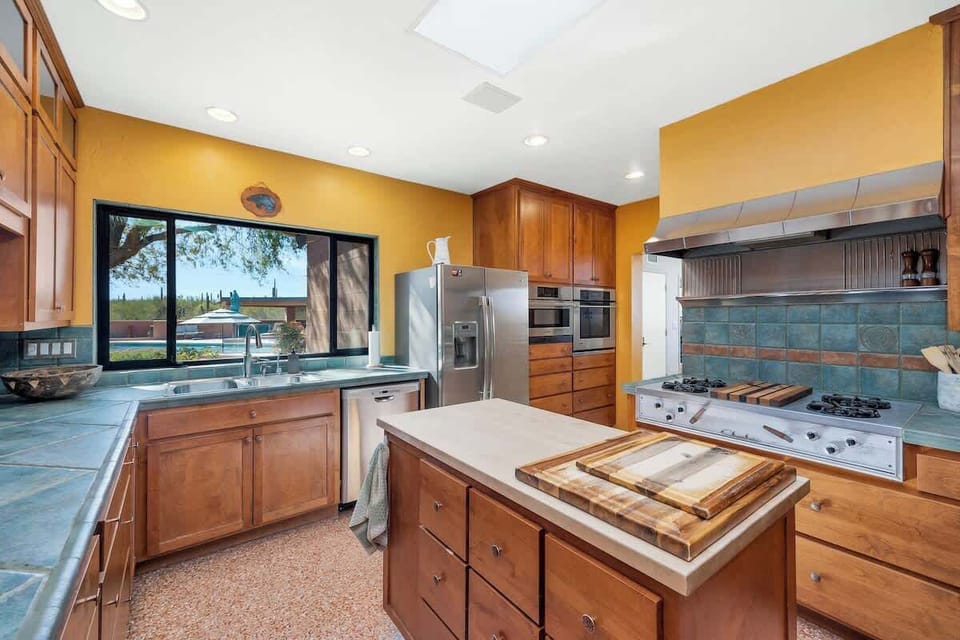 Main Kitchen area with essentials.  Prep kitchen attached, has convenience appliances.