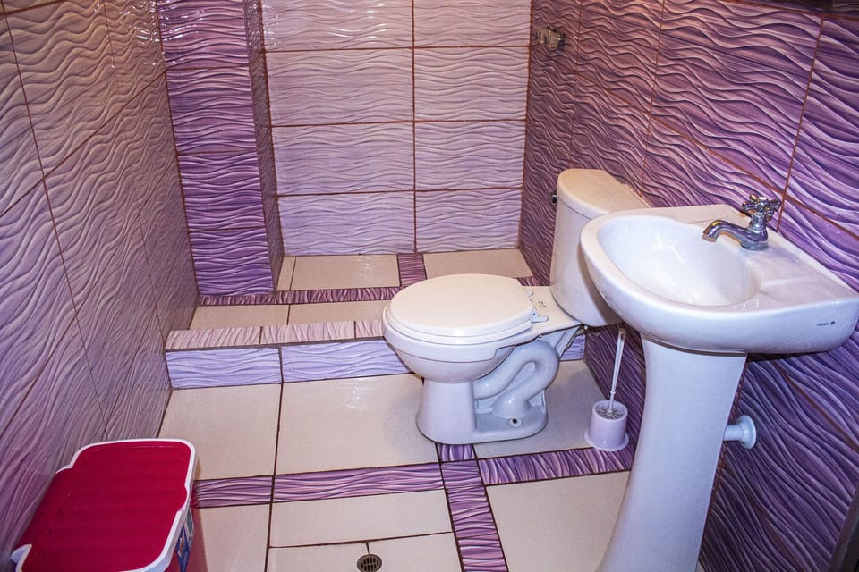 Shower, rainfall showerhead, towels, soap