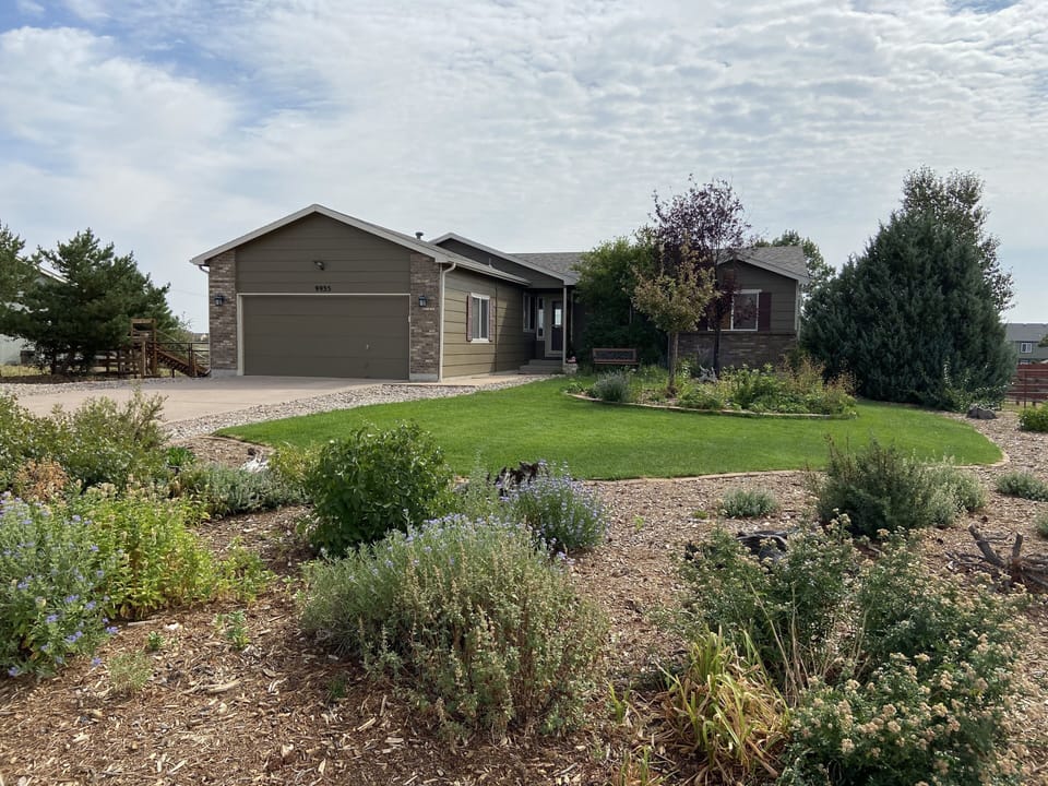 Immaculate ranch style home in Falcon, CO on 1/2 acre lot, basement rental.