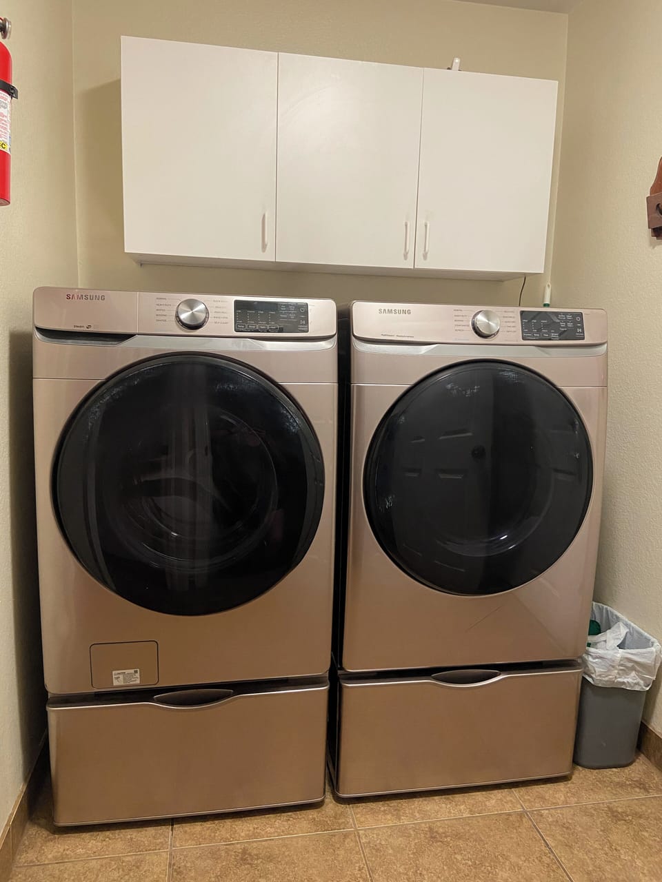 Front loading washer and drier in shared laundry room