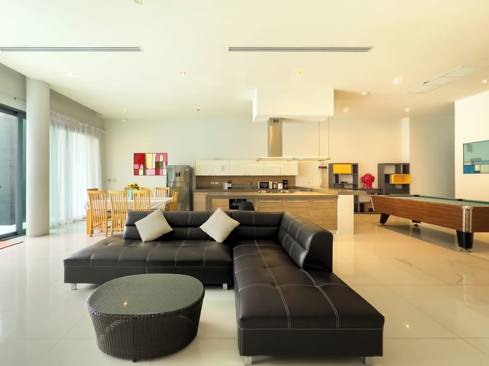 Villa | Living area | 60-inch flat-screen TV with satellite channels, Smart TV