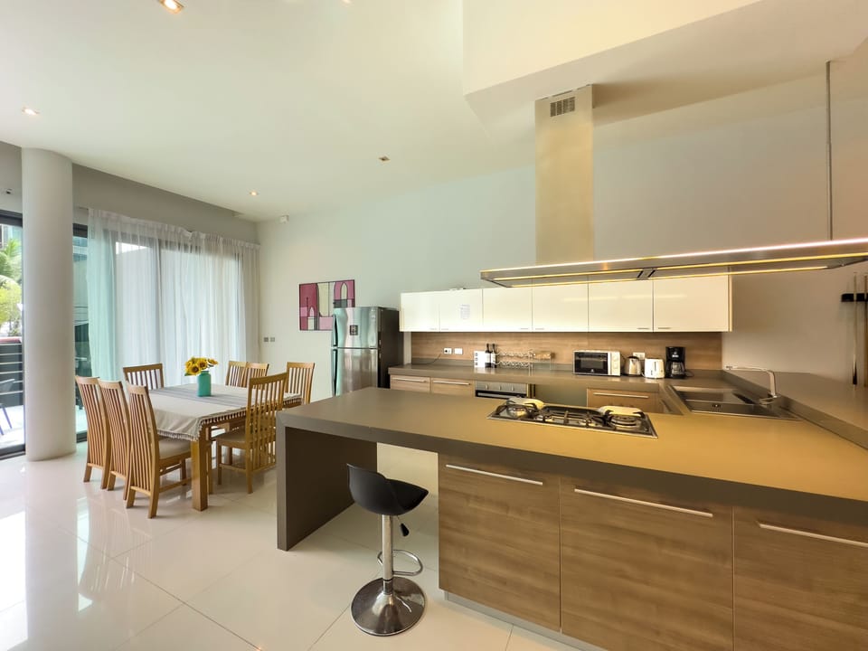 Villa | Private kitchen | Full-size fridge, microwave, oven, stovetop