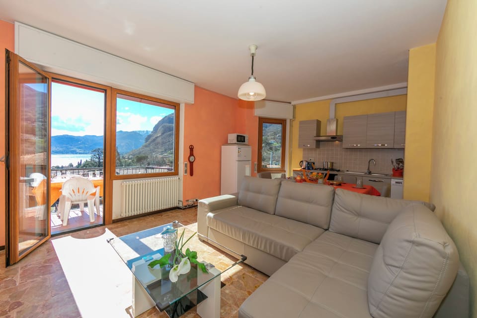 Family Apartment, Multiple Bedrooms, Mountainside (Il Panorama di Forster) | Living area | 24-inch flat-screen TV with digital channels, TV, heated floors