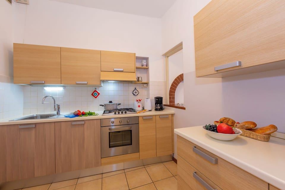 Family Apartment, Multiple Bedrooms, Lakeside (Casa Mira Al Lago) | Private kitchen | Full-size fridge, microwave, oven, stovetop
