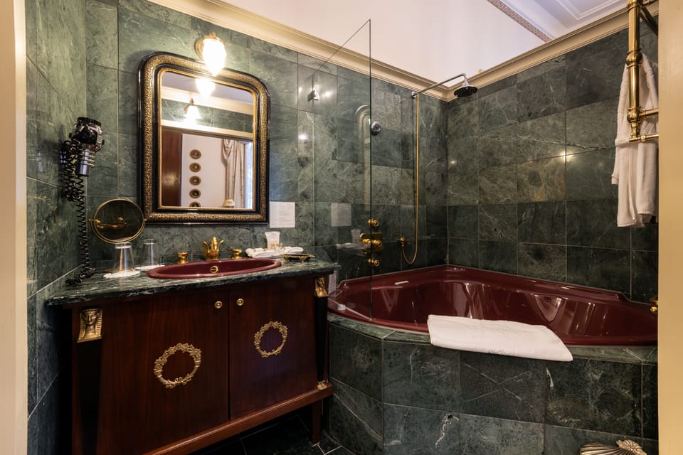 Suite, Jetted Tub | Bathroom | Free toiletries, hair dryer, bathrobes, slippers